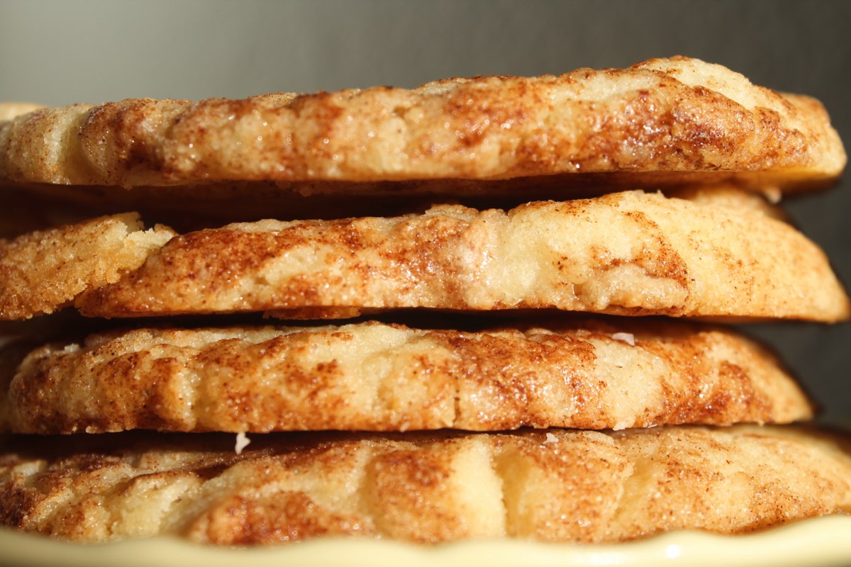 A stack of summer break snickerdoodles, cinnamon-sugar crackled edges